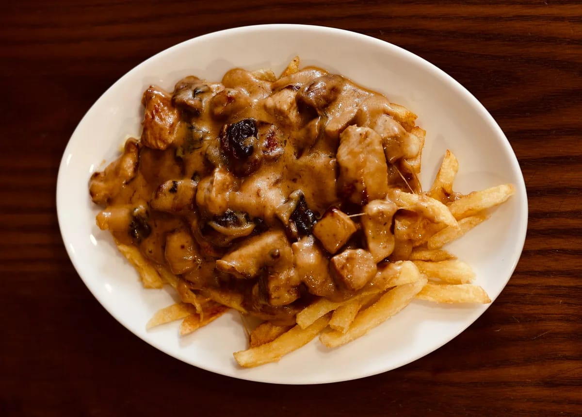 Raxo con queso y patatas